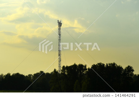 The evening horizon in the clouds and the communications tower. The evening horizon in the clouds and the communications tower. 141464291