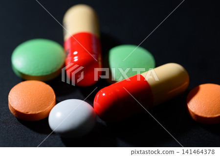Colorful tablets and capsules 141464378