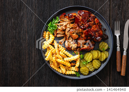 Smoky BBQ Pulled Pork Plate With Crispy Wave Fries Smoky BBQ Pulled Pork Plate With Crispy Wave Fries 141464948