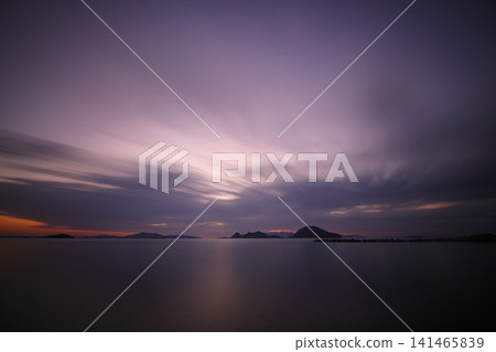 sunset on the beach. Seaside town of Turgutreis and spectacular sunsets. Selective Focus. Long Exposure shoot. tranquility scene. 141465839