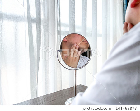 Men who are concerned about facial skin problems and enlarged pores Men who are concerned about facial skin problems and enlarged pores 141465878