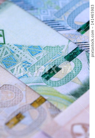 South African rand paper banknotes pile on table. South Africa ZAR currency money bills in big amount South African rand paper banknotes pile on table. South Africa ZAR currency money bills in big amount 141465983