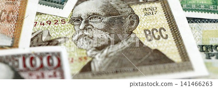 Cuban peso money bills pile on table. Cuba banknotes of CUP currency close up. Concept of business 141466263