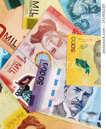 Costa Rican colon money bills pile on table. Costa Rica banknotes of CRC currency close up 141466289