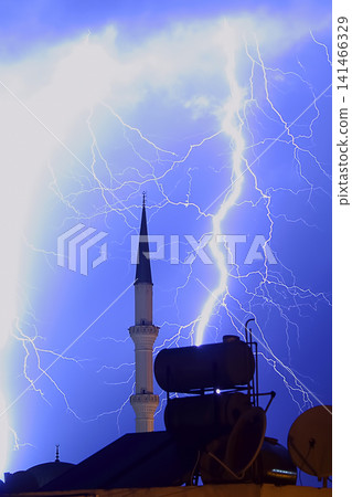 Dangerous storm of lightning and lightning in the clouds that touch the ground Dangerous storm of lightning and lightning in the clouds that touch the ground 141466329