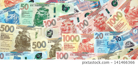Big pile of Hong Kong dollars money bills banknotes. Lots of money of Chinese Hong Kong HKD cash Big pile of Hong Kong dollars money bills banknotes. Lots of money of Chinese Hong Kong HKD cash 141466366