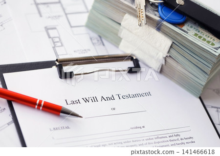 Pen and keys on Last will and testament form and planning blueprints of residential building project Pen and keys on Last will and testament form and planning blueprints of residential building project 141466618
