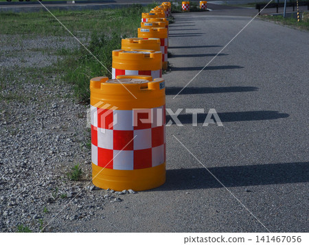 Cushion drums installed on the road Cushion drums installed on the road 141467056