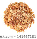 A pile of crushed roasted peanuts with brown skins isolated. Top view close-up of chopped groundnut pieces, ideal as a food ingredient for baking, snacks, or dessert toppings. 141467181