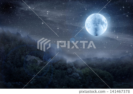 Moon and dark starry sky in the silhouette of the forest. Fog is rising over the night forest. Halloween background Moon and dark starry sky in the silhouette of the forest. Fog is rising over the night forest. Halloween background 141467378