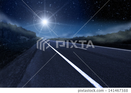 Bright star in the starry night sky lights the road at night. Birth of Jesus, Star of Bethlehem Bright star in the starry night sky lights the road at night. Birth of Jesus, Star of Bethlehem 141467388