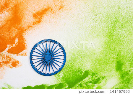 Ashoka chakra with india flag colors powder abstract Ashoka chakra with india flag colors powder abstract 141467993
