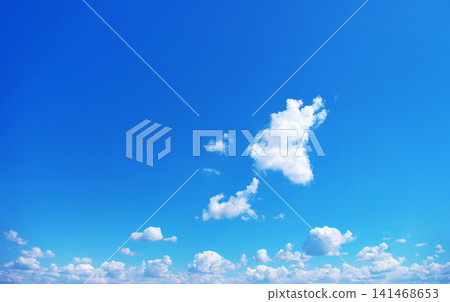 blue sky background with tiny clouds blue sky background with tiny clouds 141468653