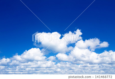 blue sky background with tiny clouds blue sky background with tiny clouds 141468772