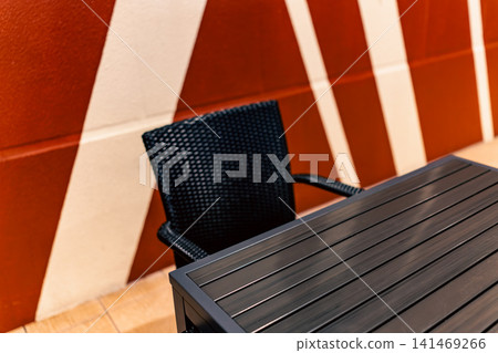 A seating area in a cafe or restaurant that showcases chic interior design. A seating area in a cafe or restaurant that showcases chic interior design. 141469266