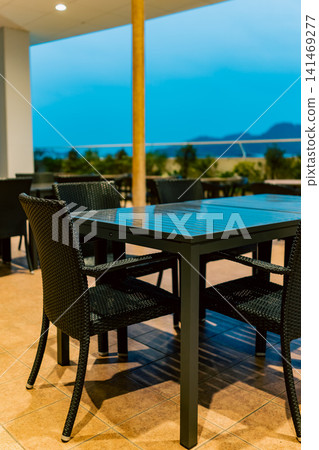 A seating area in a cafe or restaurant that showcases chic interior design. A seating area in a cafe or restaurant that showcases chic interior design. 141469277