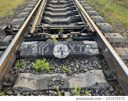 Railway Tracks with Number Four Sleeper and Concrete Details Railway Tracks with Number Four Sleeper and Concrete Details 141470575