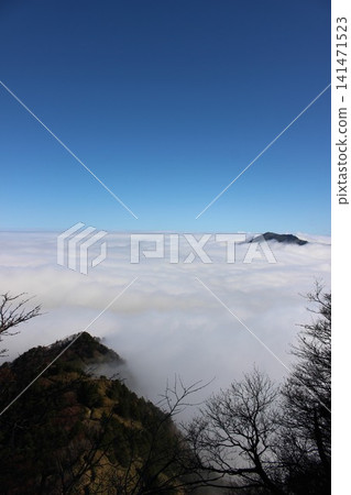 A breathtaking sea of clouds and the majestic mountain scenery of Mt. Ishizuchi, photographed in the Ishizuchi mountain range, Ehime Prefecture, near Mt. Kamegamori. A breathtaking sea of clouds and the majestic mountain scenery of Mt. Ishizuchi, photographed in the Ishizuchi mountain range, Ehime Prefecture, near Mt. Kamegamori. 141471523