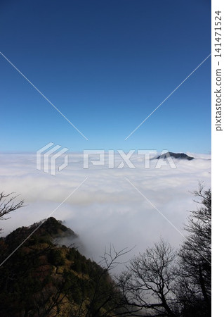 A breathtaking sea of clouds and the majestic mountain scenery of Mt. Ishizuchi, photographed in the Ishizuchi mountain range, Ehime Prefecture, near Mt. Kamegamori. A breathtaking sea of clouds and the majestic mountain scenery of Mt. Ishizuchi, photographed in the Ishizuchi mountain range, Ehime Prefecture, near Mt. Kamegamori. 141471524
