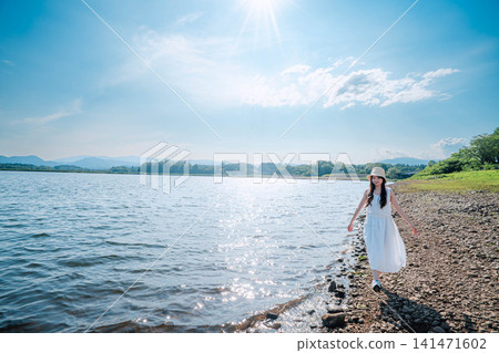 A lakeside landscape sparkling with sunlight. A lakeside landscape sparkling with sunlight. 141471602