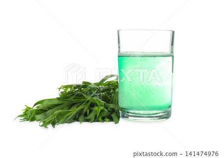 Glass of vibrant tarragon beverage sits next to fresh tarragon leaves, PNG Glass of vibrant tarragon beverage sits next to fresh tarragon leaves, PNG 141474976