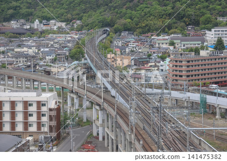 April 30 2026 Fukushima railway viaduct through dense urban neighborhood 141475382
