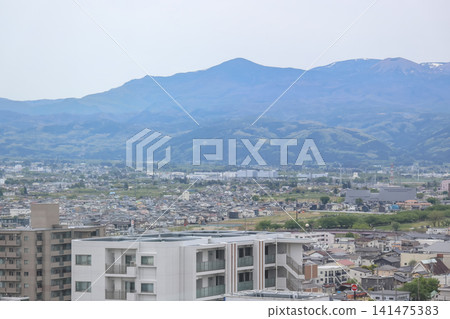 April 30 2026 Fukushima mountains with snow peaks over city April 30 2026 Fukushima mountains with snow peaks over city 141475383