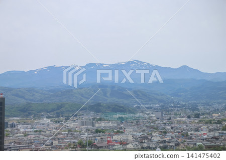 April 30 2026 Fukushima mountains with snow peaks over city April 30 2026 Fukushima mountains with snow peaks over city 141475402