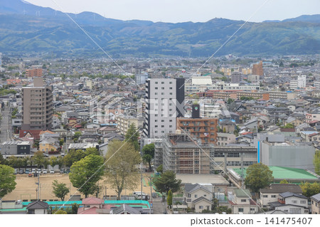 April 30 2026 Fukushima mountains with snow peaks over city April 30 2026 Fukushima mountains with snow peaks over city 141475407