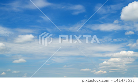 light cirrocumulus clouds in a pale blue sky light cirrocumulus clouds in a pale blue sky 141475555