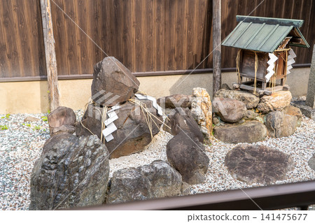 Kōjinja Shrine, home to the oldest god of matchmaking in Japan, built at the time of the founding of Heian-kyo (Kyoto), and the Sarutahiko-no-Kamiishi (Stone God) (Ishigami-san), located in Kamigyo-ku, Kyoto City. Kōjinja Shrine, home to the oldest god of matchmaking in Japan, built at the time of the founding of Heian-kyo (Kyoto), and the Sarutahiko-no-Kamiishi (Stone God) (Ishigami-san), located in Kamigyo-ku, Kyoto City. 141475677