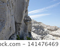 The white limestone rocks of Shirasaki Coast stand out against the blue sky. 141476469