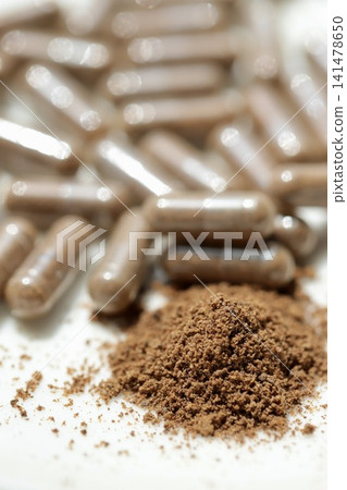 Rice bran powder in transparent capsules; rice bran supplement Rice bran powder in transparent capsules; rice bran supplement 141478650