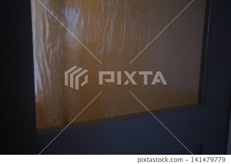 Enhanced texture of frosted glass that sparkles when it catches the light. 141479779