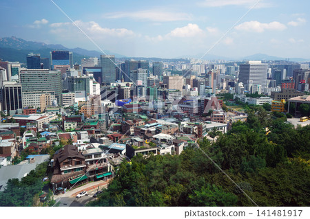 A view of the modern cityscape of Seoul, South Korea, from Namsan Mountain. A view of the modern cityscape of Seoul, South Korea, from Namsan Mountain. 141481917