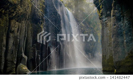 The Manai Falls in Takachiho Gorge, bathed in sunlight. The Manai Falls in Takachiho Gorge, bathed in sunlight. 141482447