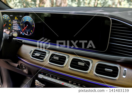 Luxury car interior dashboard with digital display Luxury car interior dashboard with digital display 141483139