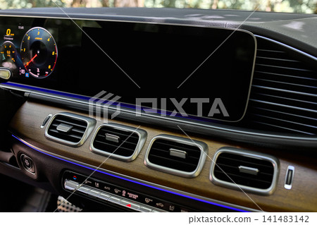 Luxury car dashboard interior with digital display Luxury car dashboard interior with digital display 141483142