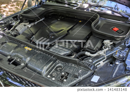 Car engine bay with hood open Car engine bay with hood open 141483148