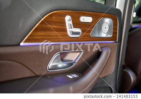 Luxury car interior door panel with ambient lighting Luxury car interior door panel with ambient lighting 141483153