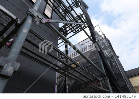 Japanese Construction Scaffolding with Safety Netting Japanese Construction Scaffolding with Safety Netting 141483179