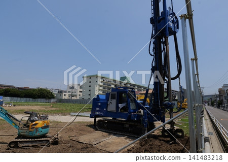 bulldozer Leveling Ground at Construction Site in Japan bulldozer Leveling Ground at Construction Site in Japan 141483218