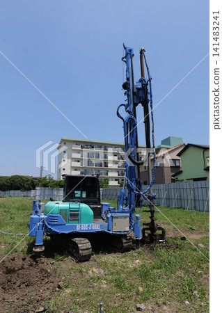 bulldozer Leveling Ground at Construction Site in Japan bulldozer Leveling Ground at Construction Site in Japan 141483241