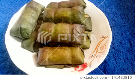 steamed banana bread roll stuffed with cheese steamed banana bread roll stuffed with cheese 141483810