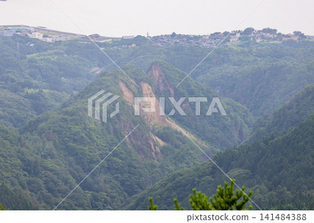Summer scenery of the sea of Sado Island, the Sado Gold Mine, and the area around Doyu-no-Warito. 141484388