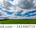 Green Farmland Beneath Dramatic Clouds in Kent England 141484719