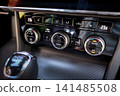 Modern car climate control panel inside vehicle 141485508