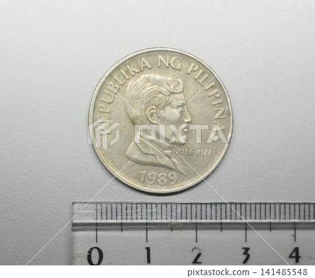 A 1 piso coin issued in the Philippines in 1989. A 1 piso coin issued in the Philippines in 1989. 141485548