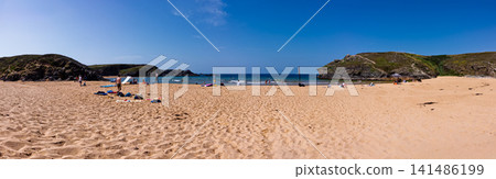 Sunny Panoramic Sandy Beach With Cliffs, Sea and People Enjoying Summer Holiday Sunny Panoramic Sandy Beach With Cliffs, Sea and People Enjoying Summer Holiday 141486199