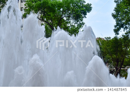 Close-up of the fountain in a public park. A part of the garden view. Nature and landscape concept. 141487845